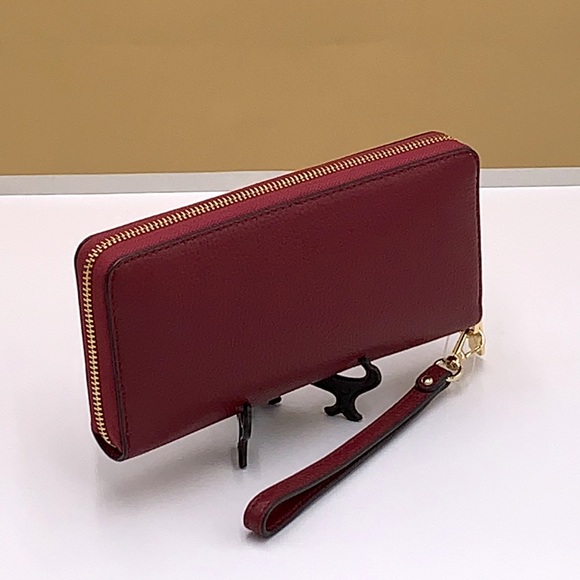 MICHAEL KORS
Leather Continental Wristlet Phone Case Wallet 
Oxblood 
NWT - Picture 9 of 16